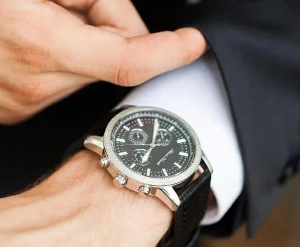 A business man wearing watch